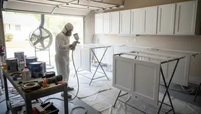 Professional cabinet painting in Philadelphia PA with spray and brush techniques for smooth kitchen finishes
